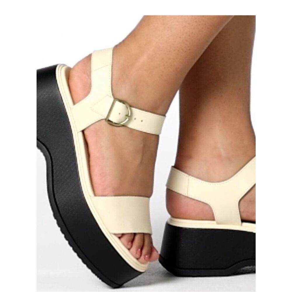 Sorel Cream and Black Platform Sandals